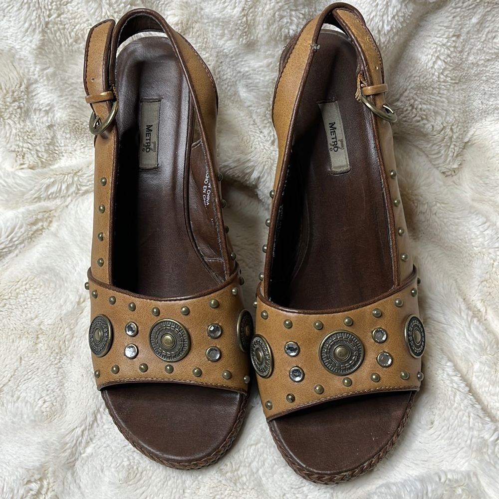 Metro 7 size 8.5 wedges with adjustable heel strap.